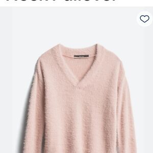 Pink V-neck sweater